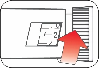 Disegno tecnico di un dispositivo medico con una scala graduata da 0 a 4 e una freccia rossa che indica il movimento verso una parte scanalata