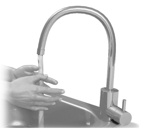 Two hands washing under running water