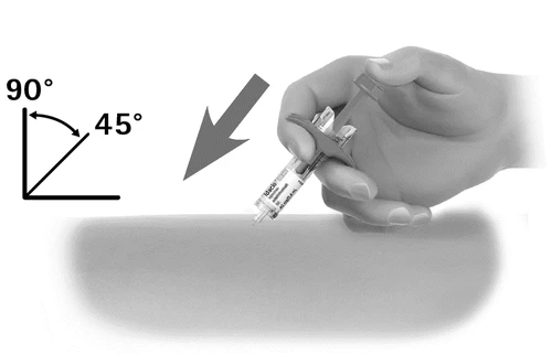 A hand holding a syringe ready to inject into the skin with a