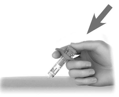 A hand holding a prefilled syringe labeled Idacio for a