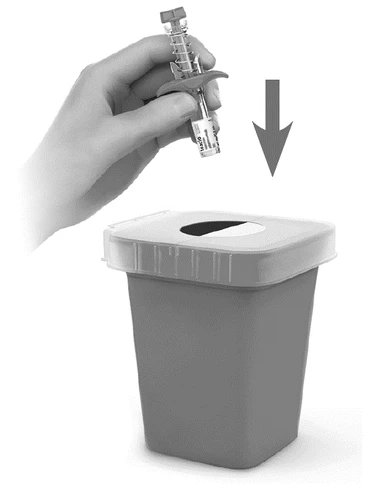 A hand holds a medical device above a disposal container with a downward-pointing arrow indicating disposal