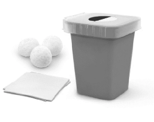 Gray container with white lid, three white balls, and a folded sheet of paper on neutral background