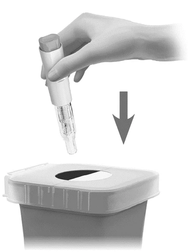A hand holding a white and transparent medical device being pushed downward with a gray arrow toward an open container