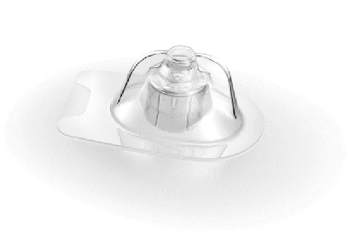 Transparent medical device consisting of a flat base and a central dome-shaped element with small lateral tubes on white background