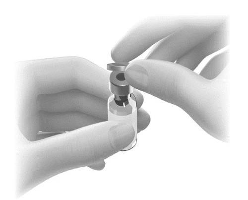 Two hands holding and opening the cap of a small transparent glass vial for liquid drug withdrawal