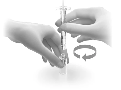 Two hands holding a transparent syringe and rotating the lower part following the direction indicated by a white curved arrow