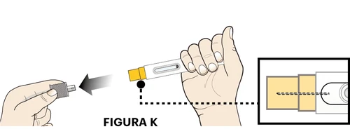 A hand holding a white and yellow medical device while a