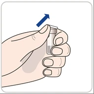 A hand holding a small glass vial vertically with a white stopper while a blue arrow indicates movement toward the