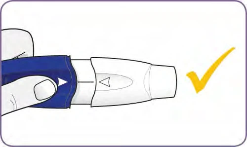 A hand holding a blue and white medical device with an orange checkmark indicating the correct usage position