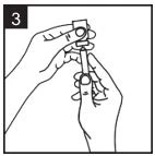 Two hands holding and preparing an injection pen for use