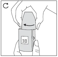 Two hands holding a medical device with a display showing 38 while an arrow indicates rotational movement of the upper cap