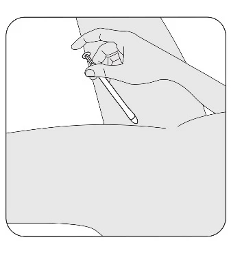A hand holding a syringe with the