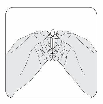 Two hands holding and opening a cylindrical container or medical device to separate its two halves vertically