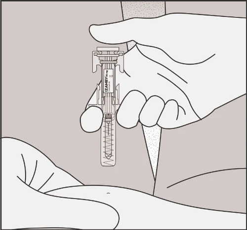A hand holding vertically a medical device Izamby for the