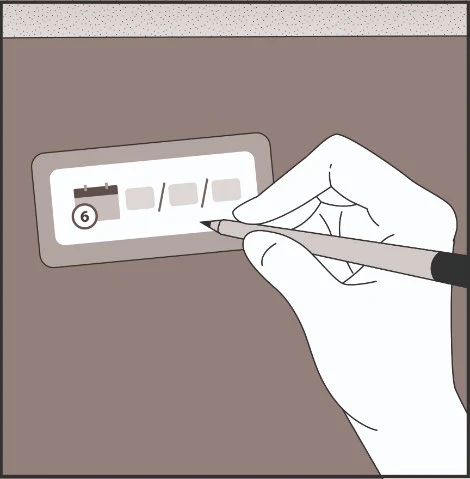 A hand holding a pen writing on a stylized calendar with the number 6 highlighted in a black circle on a brown background