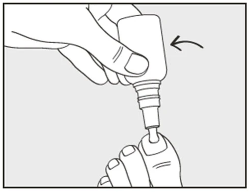 A hand holding a small bottle and applying a drop onto the tip of a finger, with an arrow indicating the downward motion