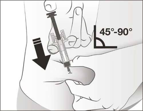 A hand holding a syringe for an