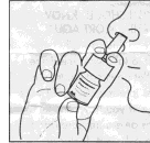 A hand holds a medication bottle with a spray dispenser tilted toward a person's nose for administration
