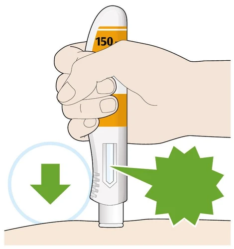 A hand holding a white and orange medical device pressing it against the skin with a green arrow pointing downward