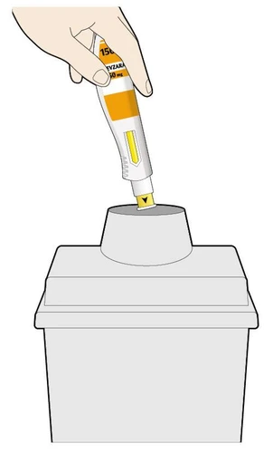 A hand holds a white and orange medical device and positions it on top of a cylindrical white container