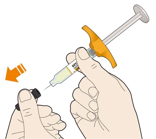 Two hands preparing a syringe with yellow liquid and orange grip to inject its contents into a small black container, with an orange arrow
