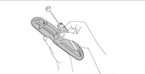 Two hands holding a medical device for subcutaneous injection