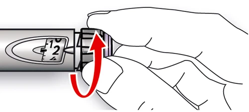 A hand rotating the top part of a medical injection pen counterclockwise