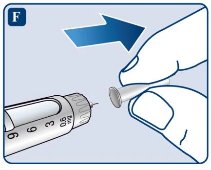 A hand grasps and slides a protective cap to the right to remove it from the