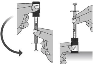 Technical drawing showing two hands rotating a syringe with needle toward a vial for