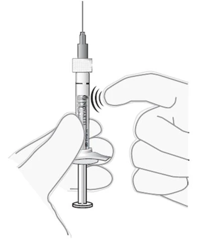 Two hands holding a syringe with needle pointing toward the