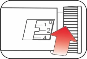 Technical drawing of a medical device with a red arrow indicating leftward sliding movement