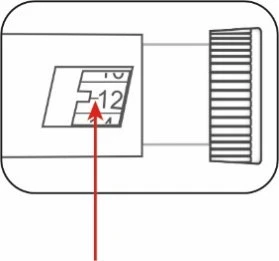 Technical diagram showing a display with numbers 10 and 12 and a red arrow pointing to number 12 next to a grooved knob
