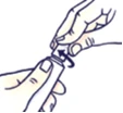 Two hands rotating a white cylindrical part to unscrew or screw a component of a medical device with a black curved arrow