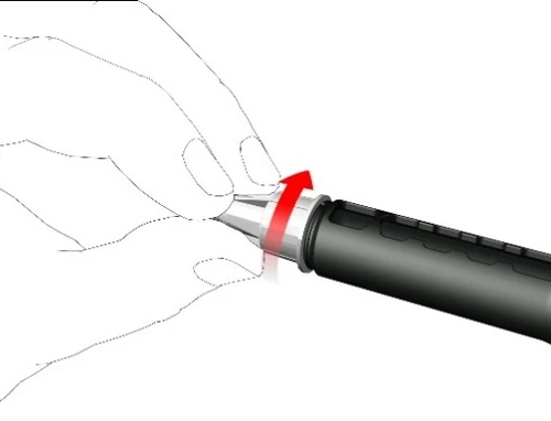 Una mano sostiene un dispositivo médico negro y gira la parte superior hacia la derecha siguiendo una flecha roja curva