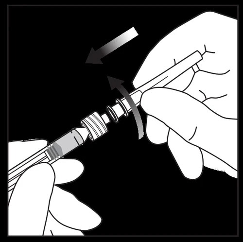 A hand rotating the top part of a pre-filled syringe to attach it
