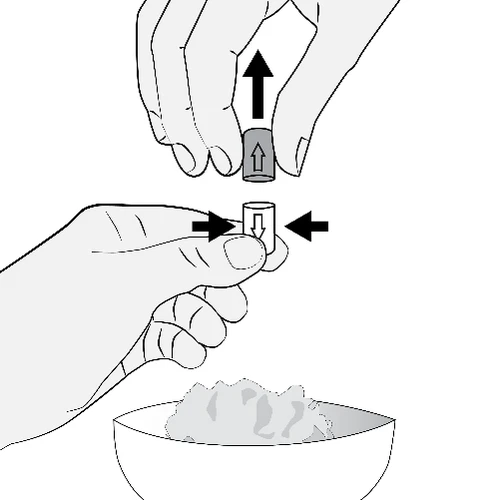 Two hands assembling two cylindrical components with black arrows indicating insertion movement above a bowl containing loose material