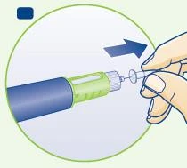 A hand turns clockwise to unscrew a small transparent vial from a cylindrical green and blue medical device