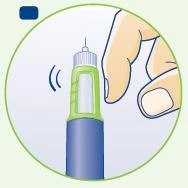 A hand holds a blue and green injection pen vertically with small motion marks near the tip indicating vibration