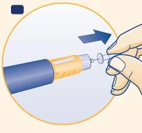 A hand rotates a transparent cap clockwise on a blue and beige cylindrical medical device, indicated by a blue arrow