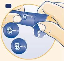 Two hands hold a blue medical device with dosage indicators showing values 0.35 mg and 1.45 mg on a light background