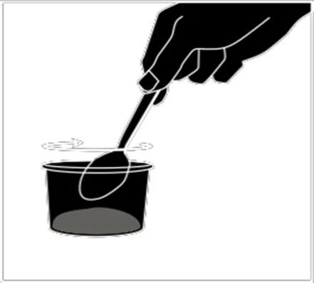 Black silhouette of a hand holding a spoon and dipping it into a small container or cup filled with liquid
