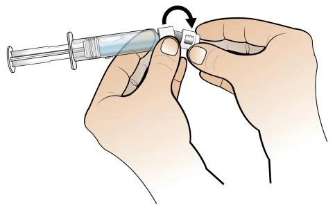 Two hands hold a syringe with blue liquid and rotate the upper part, with a black arrow indicating rotational movement
