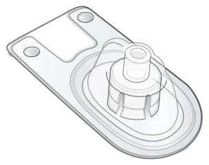 Transparent medical device with a flat rectangular base and a raised central cylindrical connector on an inset circular surface