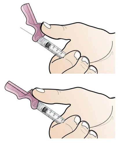 Two hands hold a syringe with a needle and a pink needle safety device for administration