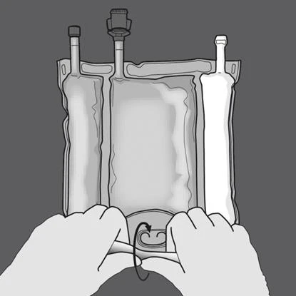 Two hands holding an infusion bag with three upper tubes and a lower connector from which a curved arrow points downward