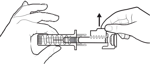 Two hands handling a medical device with a black arrow pointing toward