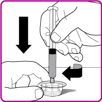 One hand pressing a syringe vertically downward as the