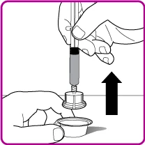 One hand holding a syringe inserted vertically into a circular container with a black arrow pointing towards the