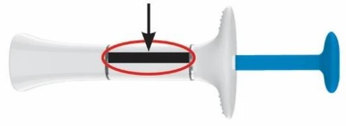 Technical diagram of a white medical device with a centrally located black indicator circled in red and a black arrow pointing downward