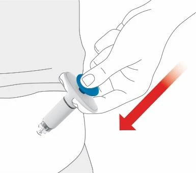 A hand holding a white medical device with a blue button pressing it against the skin of the thigh indicated by a red downward arrow